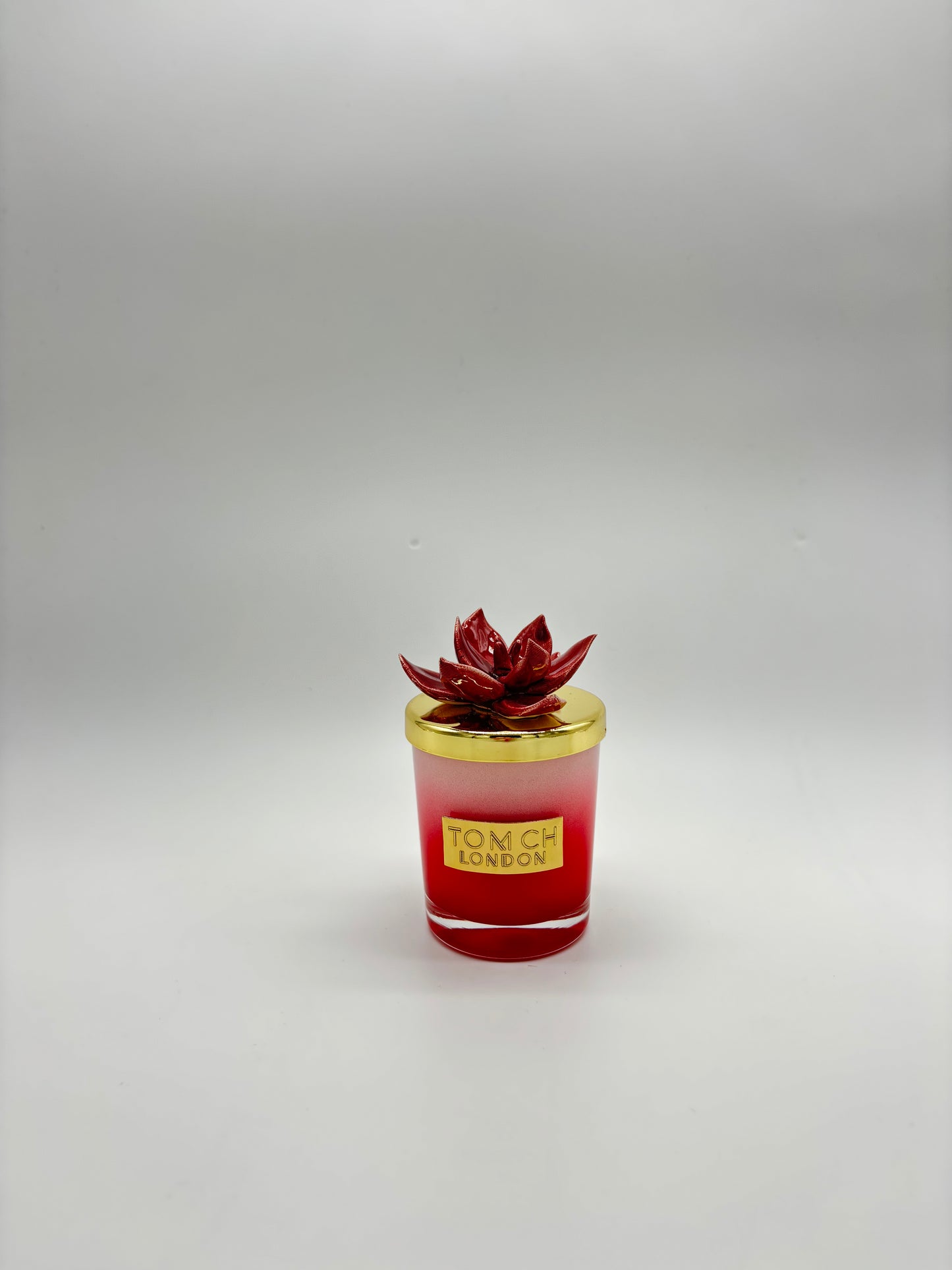 Candela con tappo a fiore linea 'Denise Curcuma' rossa - TOM CH LONDON