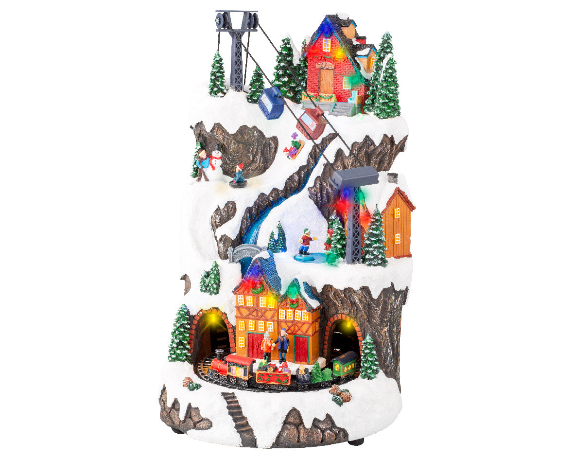 Giostra natalizia 'Villaggio con sciatori' 25,5x29x40H - Lumineo